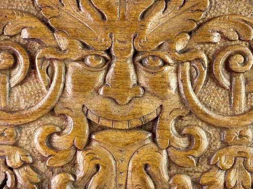 Pair of walnut panels carved with mascarons. French, late 16th century. - 