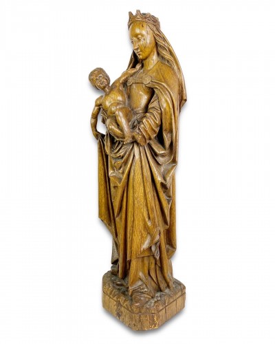 Antiquités - Sculpture en chêne de la vierge et de l'enfant. Nord de la France, début du 16e siècle