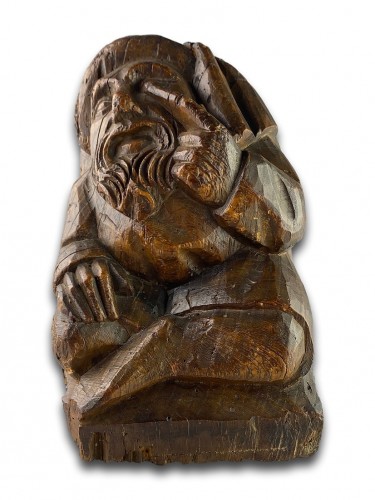 Sculpture  - Corbel of a seated man in fashionable clothing. Northern France, 15th centu