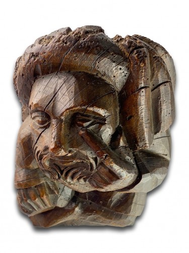  - Corbel of a seated man in fashionable clothing. Northern France, 15th centu