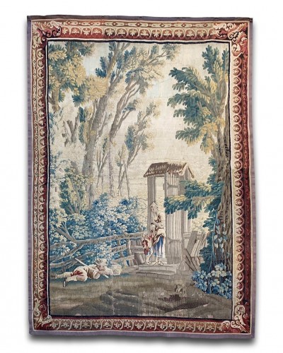 Pastoral tapestry family in a woodland garden. Aubusson, c.1760-1770.