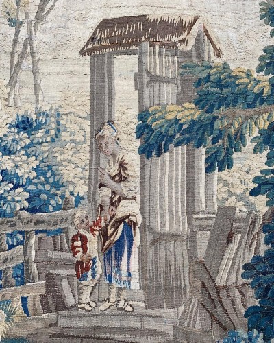 Tapisserie & Tapis  - Famille de tapisserie pastorale dans un jardin boisé. Aubusson, vers 1760-1770.