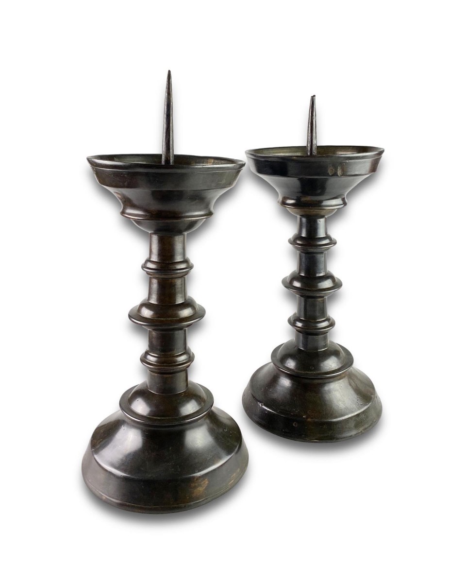 Large pair of patinated brass pricket candlesticks. Germany early