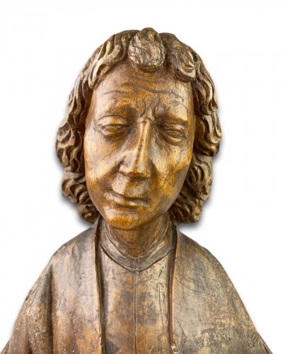 Antiquités - Oak bust of Saint John the Evangelist. French, 15th century.