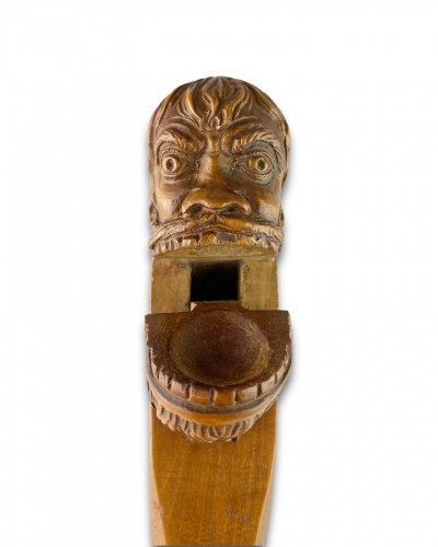 Curiosities  - Fruitwood nutcracker in the form of a Wildman. French, 18th century.
