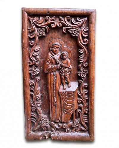 18th century - Hardwood relief with Saint Anthony and the Christ Child. Goa, 18th century.