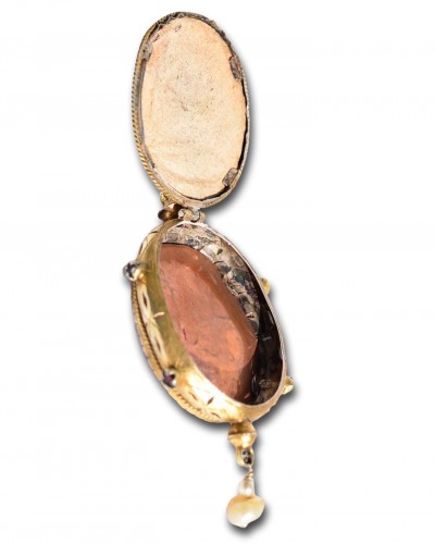 Silver gilt and rock crystal verre églomisé pendant. German circa 1600 - 