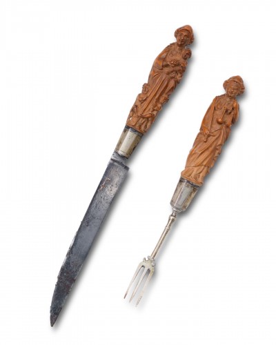  - Pair of allegorical boxwood handled cutlery. Netherlandish, mid 17th centur