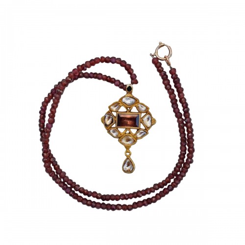 Enamel And Gold Pendant With Diamonds And A Table Cut Garnet, India Circa