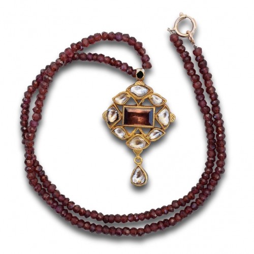 Enamel And Gold Pendant With Diamonds And A Table Cut Garnet, India Circa - 