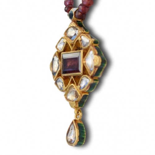  - Enamel And Gold Pendant With Diamonds And A Table Cut Garnet, India Circa