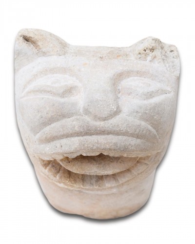 Architectural & Garden  - Romanesque stone fountain head in the form of a cat. English, 12th century.