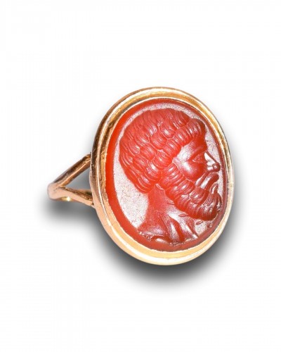  - 18th century gold ring set with a carnelian intaglio of a Roman bust.