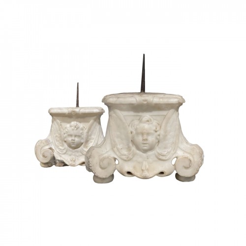 Pair of candelabra in white Carrara marble. Carved on three sides