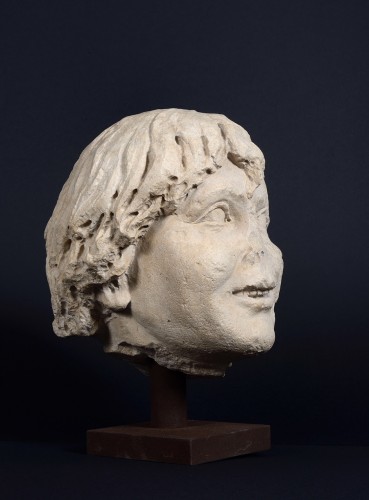 Sculpture  - Head of a Smiling Youth (Angel?) - Île-de-France (?), mid 13th century