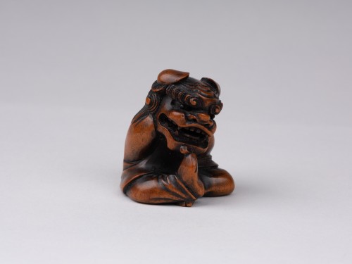 A wooden model Netsuke  by Sukeyuki of a shishimai performer. Japan Edo - Asian Works of Art Style 