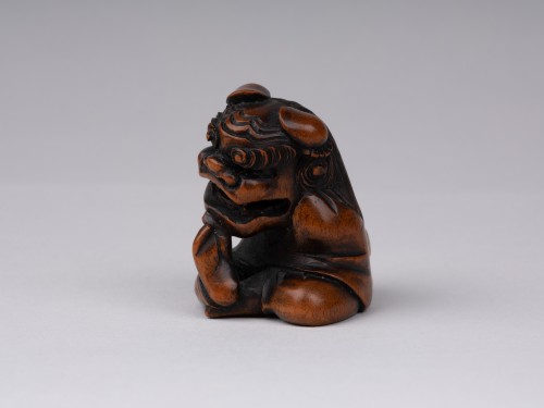 Asian Works of Art  - A wooden model Netsuke  by Sukeyuki of a shishimai performer. Japan Edo