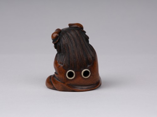 19th century - A wooden model Netsuke  by Sukeyuki of a shishimai performer. Japan Edo