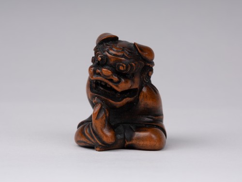  - A wooden model Netsuke  by Sukeyuki of a shishimai performer. Japan Edo