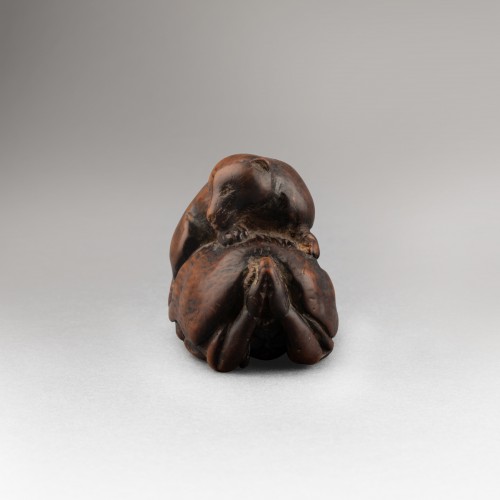Asian Works of Art  - Netsuke – tanuki and hunter. Japan Edo 18th century