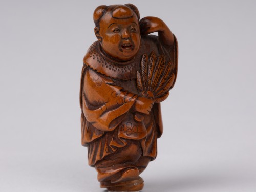 Asian Works of Art  - Netsuke By Ikka. Karako carrying a fan, Japan Edo