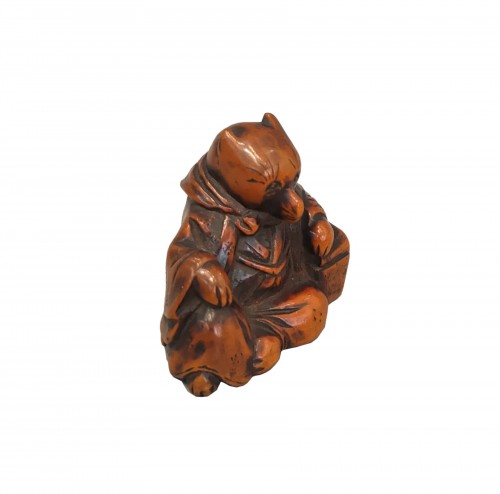 Netsuke, modèle représentant un renard déguisé en prêtre, Japon Edo