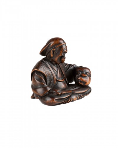 Netsuke – sculpteur de masque par Masayuki, Japon Edo