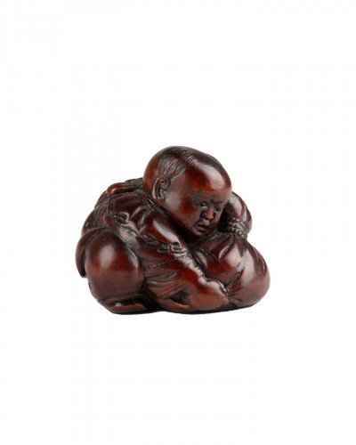 Netsuke by Masakiyo – A wood netsuke of a Karako. Japan Meiji