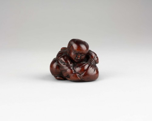 Netsuke by Masakiyo – A wood netsuke of a Karako. Japan Meiji - Asian Works of Art Style 