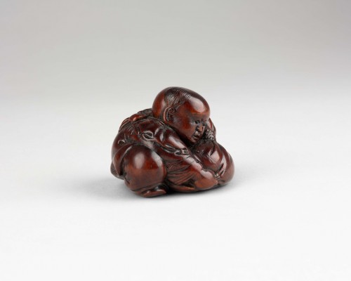 Asian Works of Art  - Netsuke by Masakiyo – A wood netsuke of a Karako. Japan Meiji