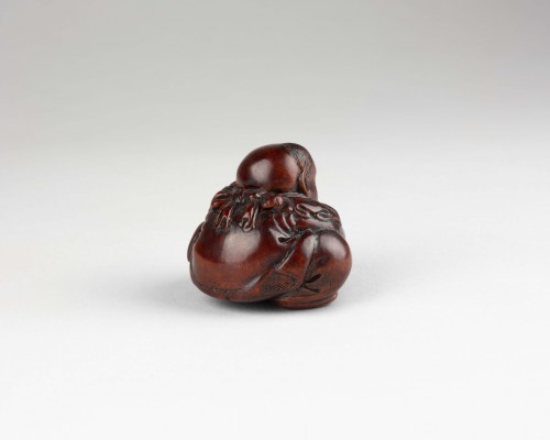 Netsuke by Masakiyo – A wood netsuke of a Karako. Japan Meiji - 