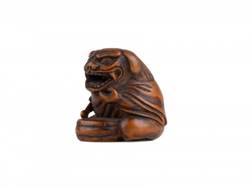 Netsuke par Sansho – Shishimaï en bois sculpté, Japon Edo