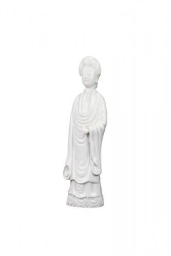 A Dehua Blanc de Chine standing figure of a lady, Kangxi period