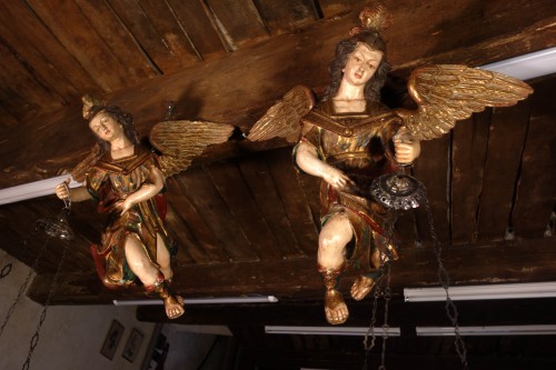  - Pair of polychrome angels with silver lamps, early 19th century