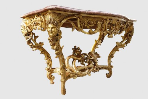  - Table en console aux têtes de faune, bois doré XIXe