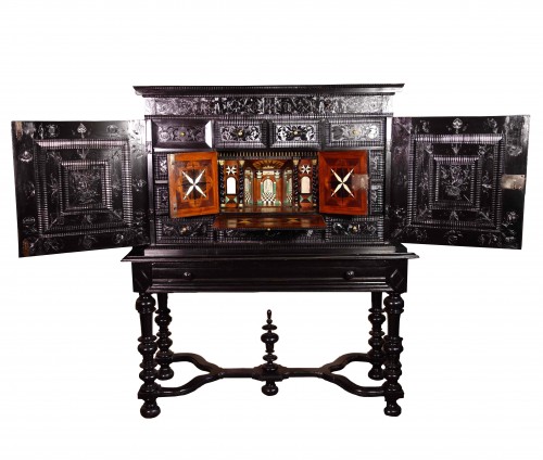 Ebony cabinet with scenes of the Holy Family