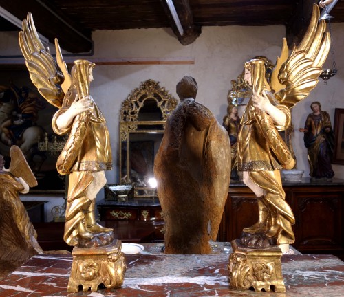  - Large pair of torchiere angels in gilded wood,