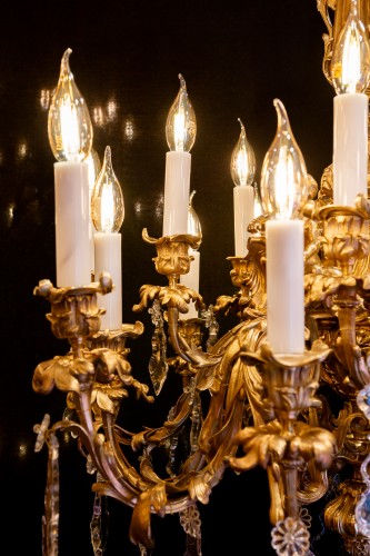 Antiquités - Victor Raulin (1867-1925) and Baccarat - Chandelier aux Amours in Gilt Bronze