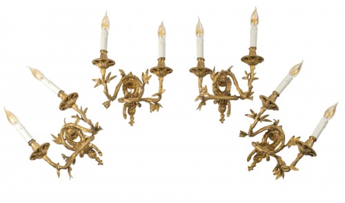 Set of four Chiseled Bronze two-light sconces Italy circa 1850