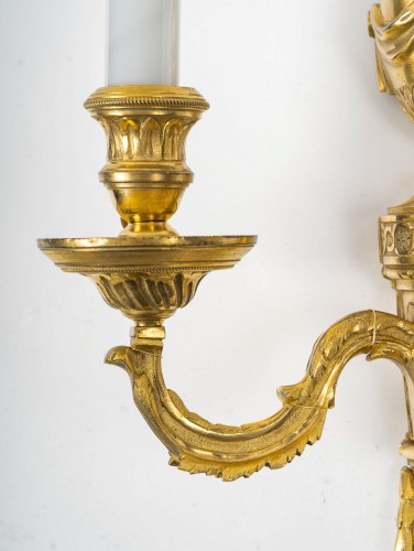 18th century - Pair of Louis XVI Period Chiseled and Gilded Bronze Two-Light Wall Sconces
