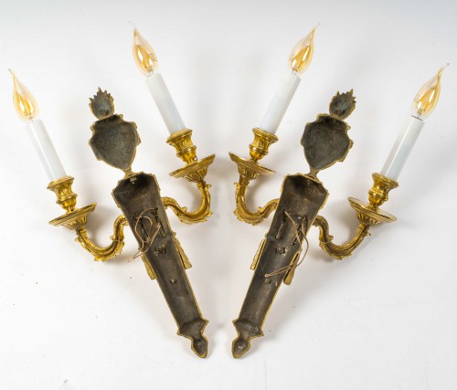 Antiquités - Pair of Louis XVI Period Chiseled and Gilded Bronze Two-Light Wall Sconces