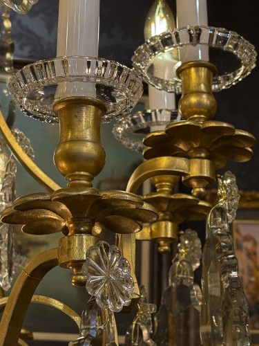 Important lustre Baccarat en bronze doré et décor de cristal - 