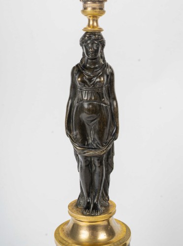 Antiquités - Paire de candélabres néoclassiques en bronze doré et patiné, époque Empire