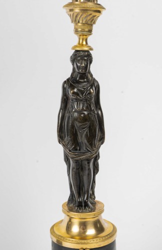 Antiquités - Paire de candélabres néoclassiques en bronze doré et patiné, époque Empire