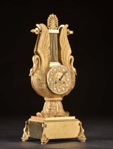 Antiquités - Pendule cygne lyre d'époque Empire