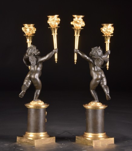Antiquités - A pair of Empire gilt and patinated bronze candelabra