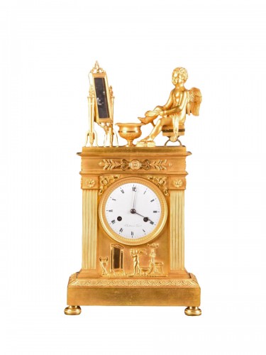 Pendule Empire en bronze doré au mercure avec Cupidon, signée Chrétien à Paris