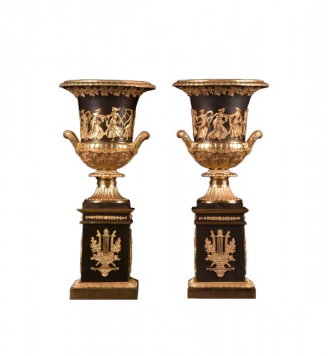 A Pair Of Medici Empire Vases/urns