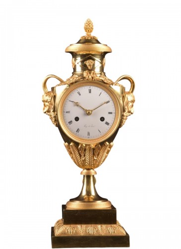 An Empire Gilt-bronze Vase Clock, Signed Buzé à Paris, Early 19th Century