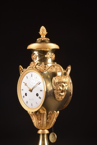 Horology  - An Empire Gilt-bronze Vase Clock, Signed Buzé à Paris, Early 19th Century